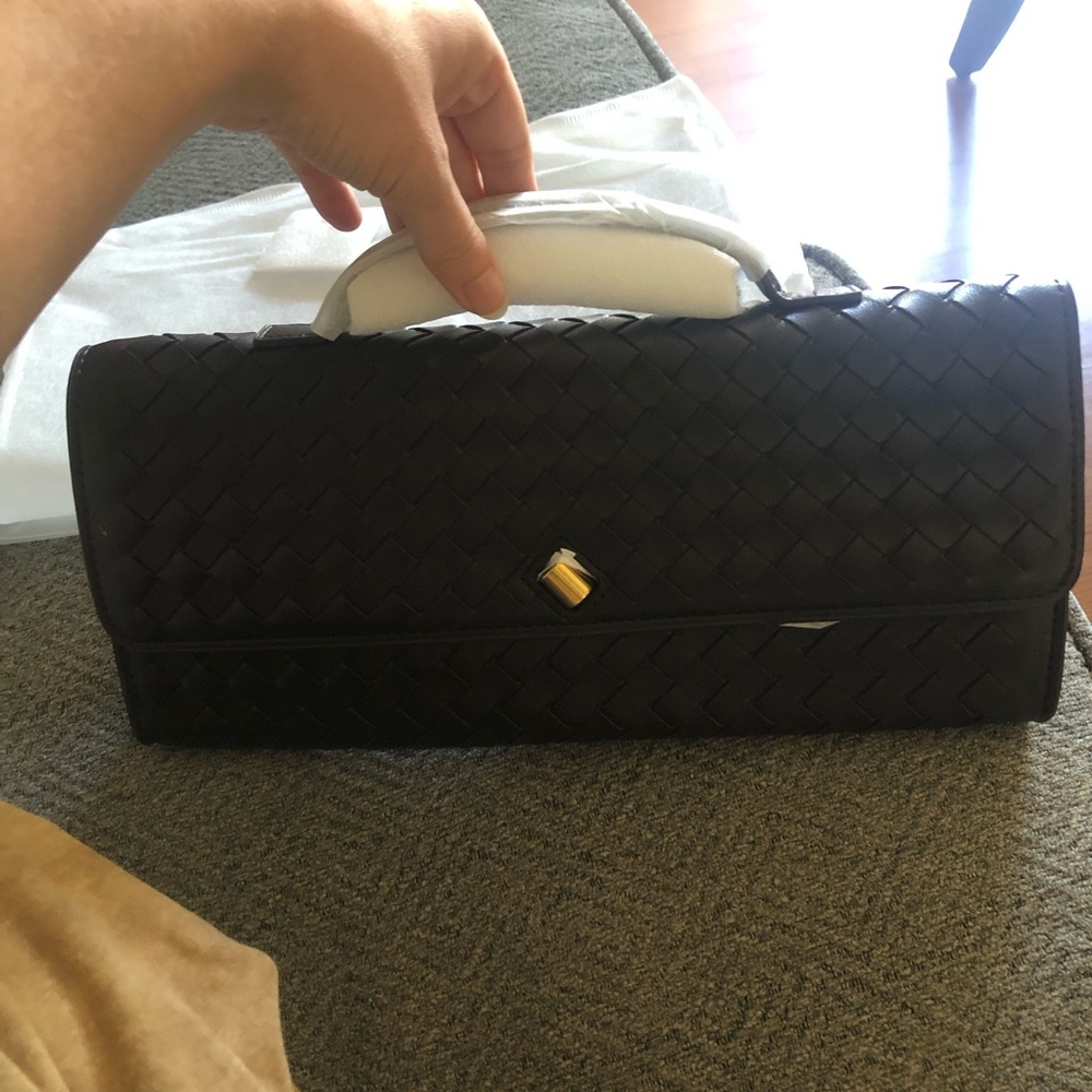 Woven leather clutch